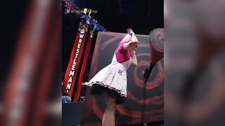 WWE - Alexa Bliss turning a crank at Wrestlemania 37