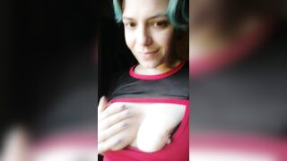 Squeezes boobs out of shirt