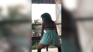 Latina Teen twerks her tasty ass on public balcony