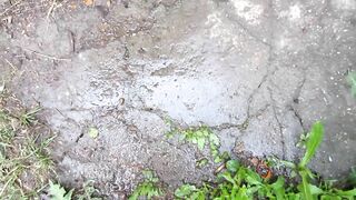 Pissing standing and farting, teenager girl in the yard of an abandoned house.