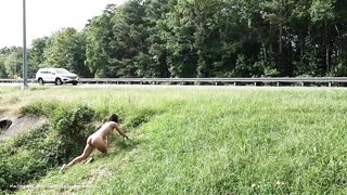 Crawling completely naked in public next to the road