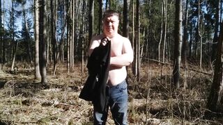 Masturbating naked in winter forest