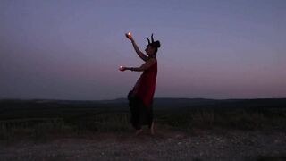 Candels Dance against the background of the night sky