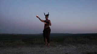 Candels Dance against the background of the night sky