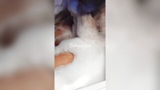 Busty MILF caught showering and masturbating with a huge dildo