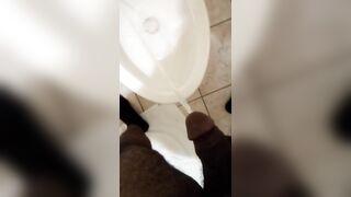 Pissing in toilet with soft dick