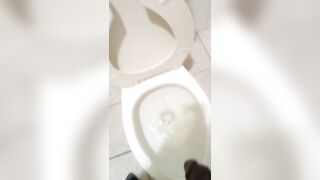 Pissing in toilet with soft dick