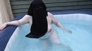 naked in Niqab in the hot tub