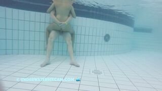 Nudist couple fucks in public pool and the voyeur is watching them while the hidden cam is recording!