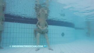 Nudist couple fucks in public pool and the voyeur is watching them while the hidden cam is recording!