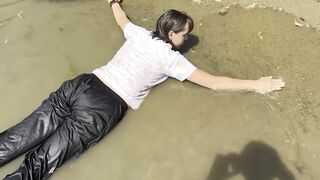 Wetlook down at the Estuary. Wearing black sports trousers and a white T-shirt