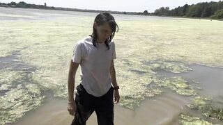 Wetlook down at the Estuary. Wearing black sports trousers and a white T-shirt