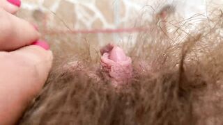 Big clit super hairy pussy in extreme close up