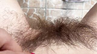 Big clit super hairy pussy in extreme close up