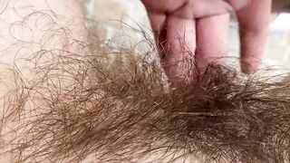 Big clit super hairy pussy in extreme close up