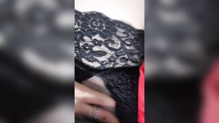 Gentle homemade striptease in black. Close-up