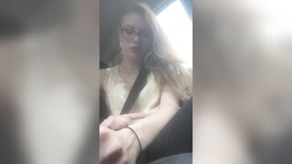 Beautiful junkie doing a shot in the car