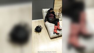 Fully dressed crossed legs orgasm in a store