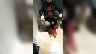 Fully dressed crossed legs orgasm in a store