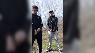 TWO GUYS JERK OFF OUTDOORS