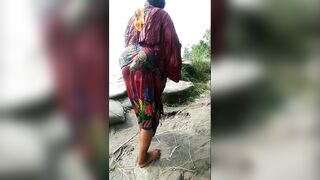 My fat wife He is take a shower in river