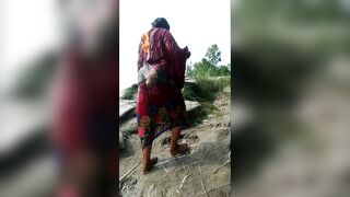 My fat wife He is take a shower in river