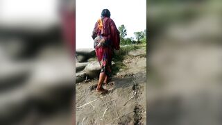 My fat wife He is take a shower in river