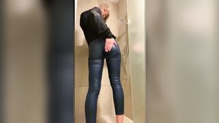 Girl showers in tight jeans