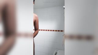 Cute girl play her body in bathroom. Homemade video