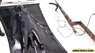 Fejira com Orgasm in a more wrapped latex sleeping bag