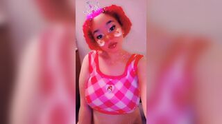 Pink anime dream girl plays with her big boobs