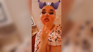 Harajuku emo slut plays with her boobs