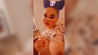 Harajuku emo slut plays with her boobs