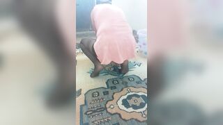 Hot mature wiping the carpet by bending over