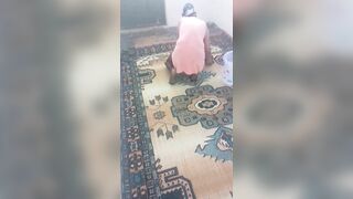 Hot mature wiping the carpet by bending over