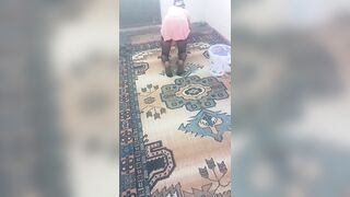 Hot mature wiping the carpet by bending over