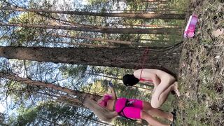 Domina Evgenia - a slave tied to a tree sucking my strapon and eating my ashes