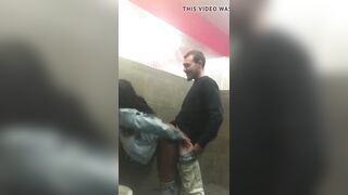 Black girl fucks white cock in club restroom