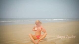 Beautiful Yoga Teacher having Tantra Practice on the Beach