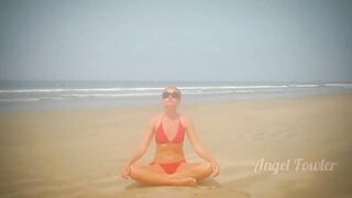 Beautiful Yoga Teacher having Tantra Practice on the Beach