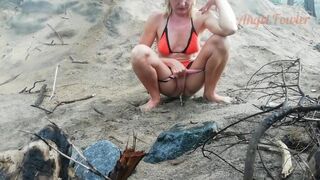 Public Peeing Teen Girl on the Beach