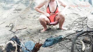 Public Peeing Teen Girl on the Beach